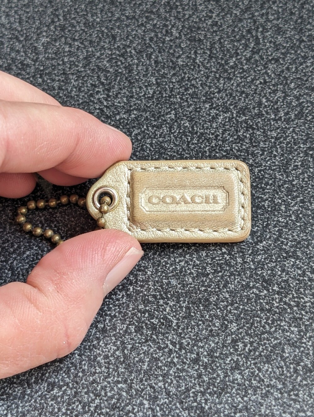 Coach Vintage Gold Leather Key Tag Bag Charm Collectible Chic with Embossed Logo